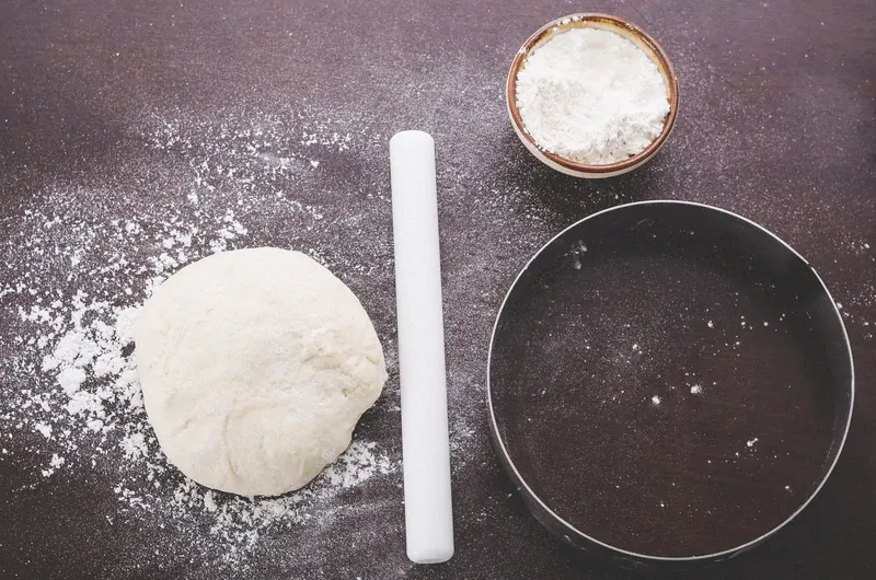 Silicone cake molds photographed on a wooden kitchen countertop