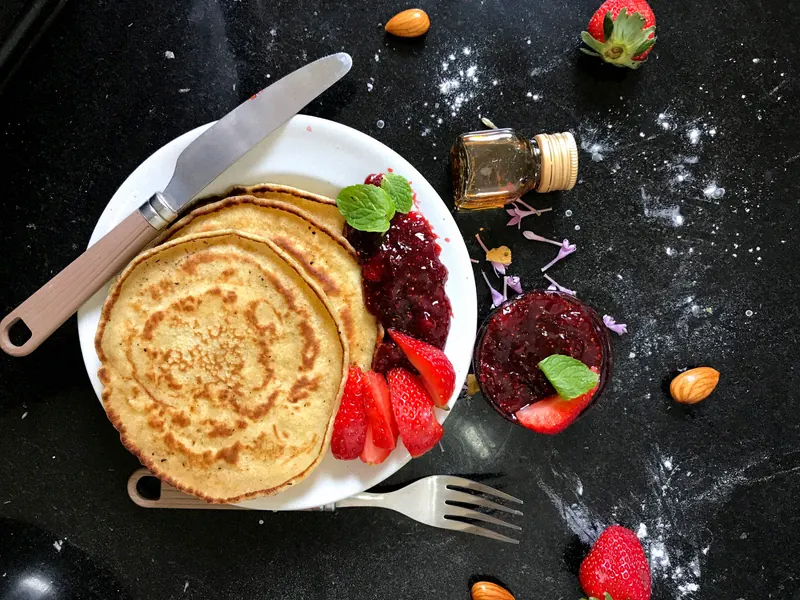Silicone plates photographed on a wooden kitchen countertop