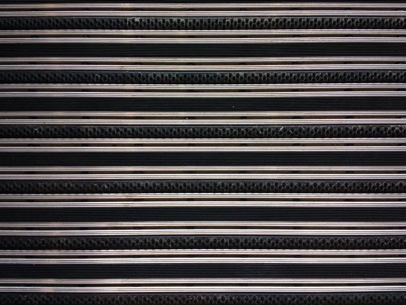 Silicone rubber heaters photographed on a workshop bench