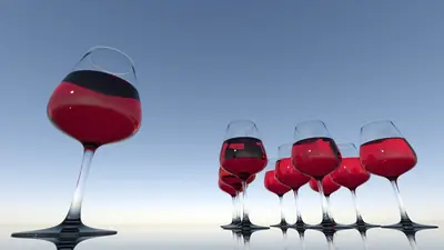 Seven silicone wine glasses filled with red wine against a blue gradient background